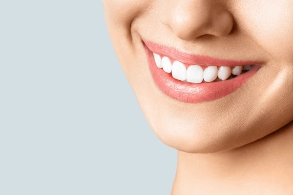 Beautiful female smile after teeth 600nw 1728530461